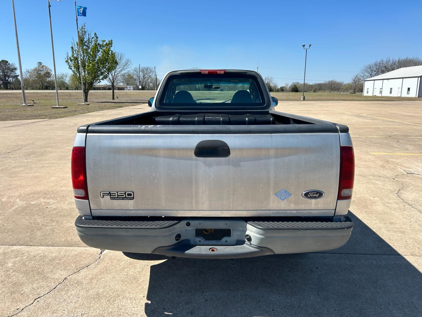 2003 GRAY /Gray Ford F-150 XL Long Bed 2WD (2FTPF17Z43C) with an 5.4L V8 SOHC 16V engine, AUTOMATIC transmission, located at 17760 Hwy 62, Morris, OK, 74445, (918) 733-4887, 35.609104, -95.877060 - 2003 FORD F-150 HAS THE 5.4 TRITON ENGINE AND IS 2WD. THIS TRUCK HAS MANUAL SEATS, MANUAL WINDOWS, MANUAL LOCKS, AMFM STEREO, CASSETTE PLAYER, BEDCOVER, ONLY 48,847 ACTUAL MILES!! CLEAN TITLE AND FREE CARFAX REPORT GOODYEAR 245/75R16 TIRES ***DOES HAVE SOME RUST AND PAINT DAMAGE AS SHOWN IN THE PI - Photo#5